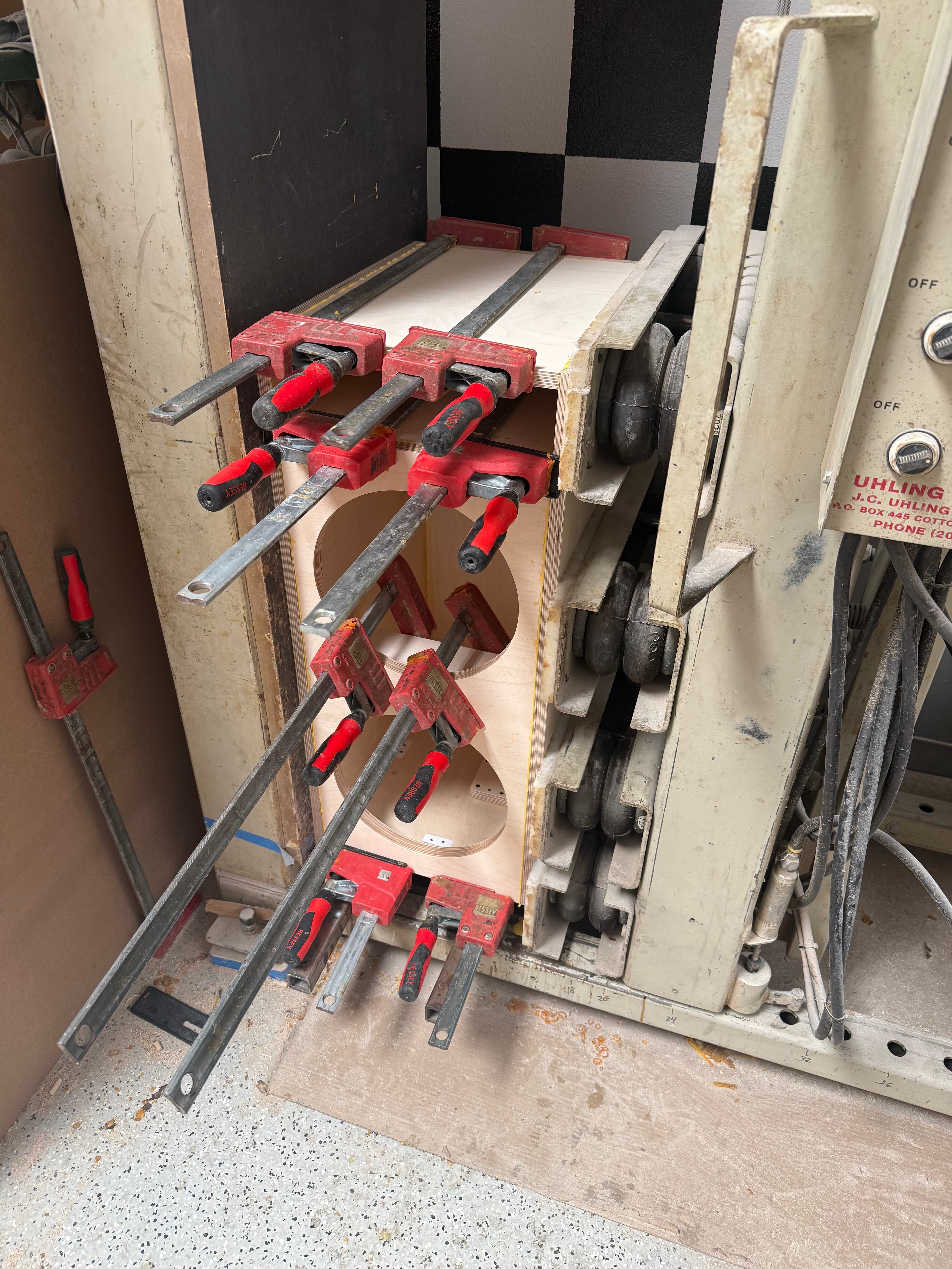 Subwoofer enclosure clamped during glue-up assembly