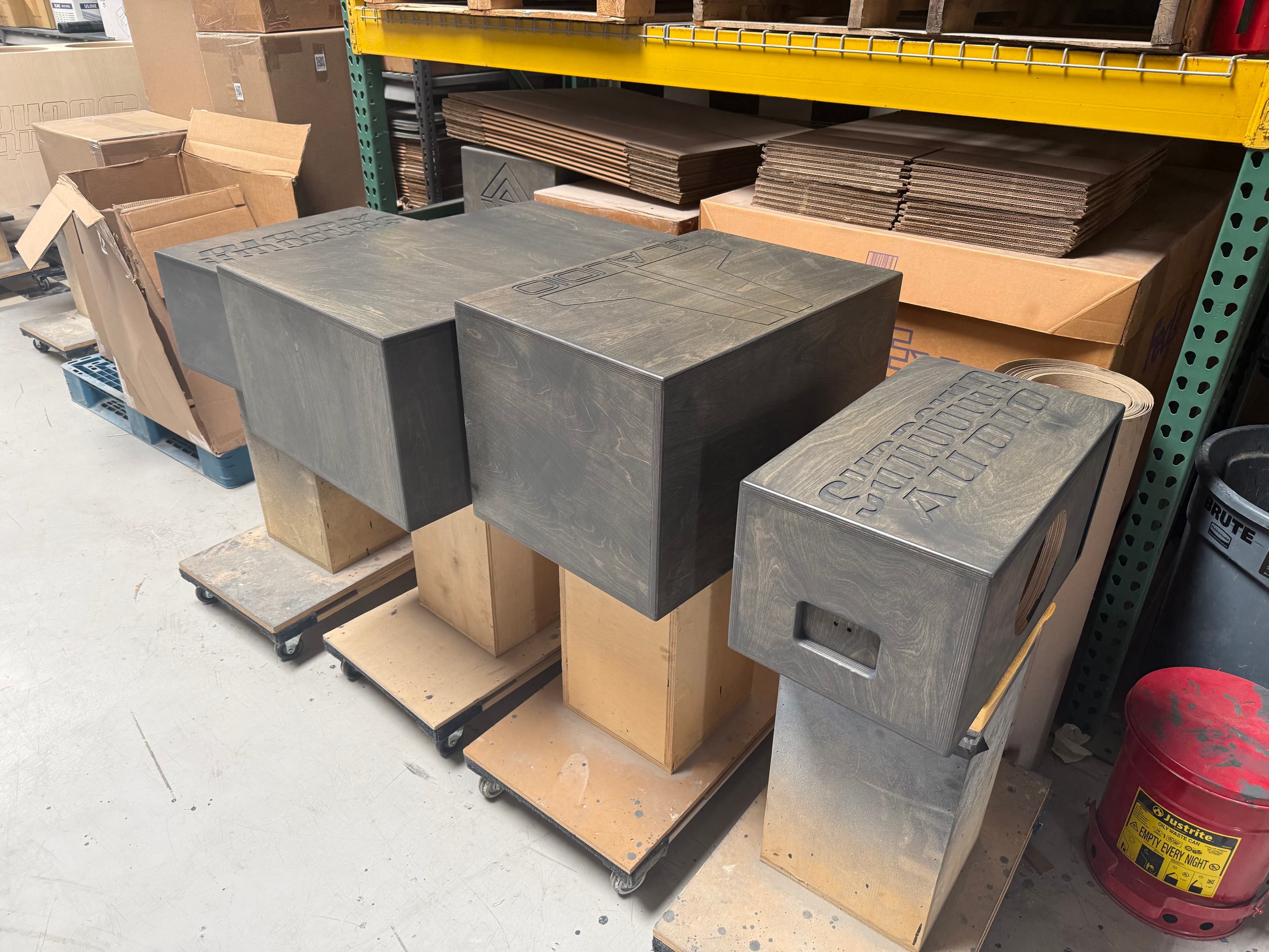 Finished stained subwoofer enclosures ready for shipping
